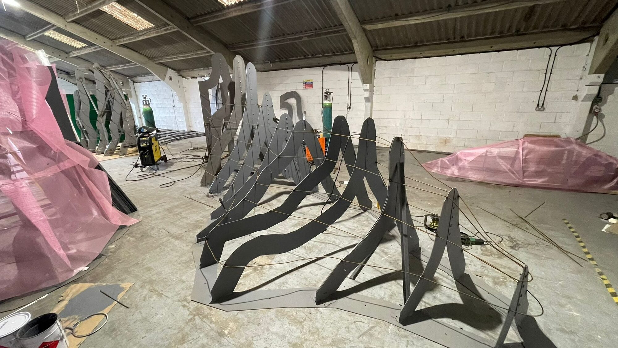 Multiple sections of armature with rebar reinforcement